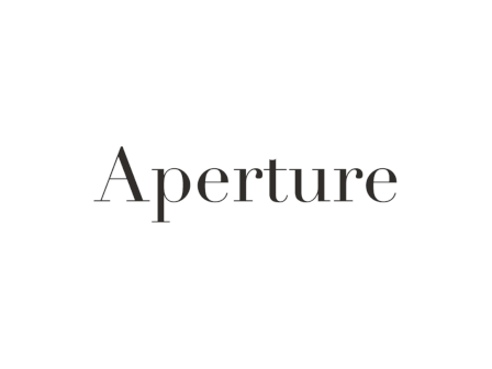 The image contains the word "Aperture" written in a stylish font, centered on a white background.